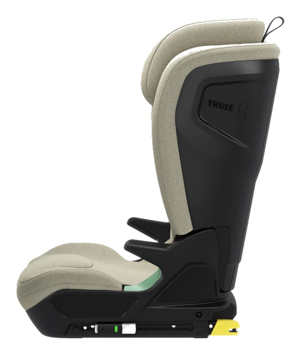 Thule Palm i Soft Beige i sidovy, visar ISOFIX-fäste och grön bältesguide